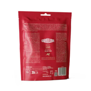 Red dog food bag standing upright; back packaging shows product branding and ingredients, with 'CARNILOVE' and 'CRUNCHY LAMB' visible and small text panels.