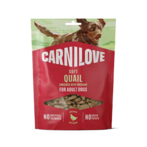 Carnilove Soft Quail adult dog treats bag with a jumping dog illustration on a green top; shows treats through a window and notes no artificial colorants or grain.