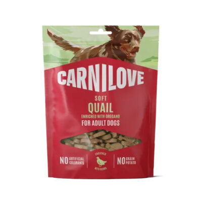 Carnilove Soft Quail adult dog treats bag with a jumping dog illustration on a green top; shows treats through a window and notes no artificial colorants or grain.