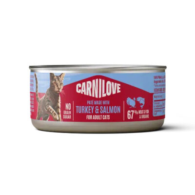 Carnilove cat food can, turkey & salmon for adult cats, 67% meat/fish, no grain. Red label with a cat image on blue background.