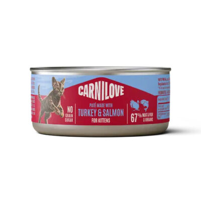 Can of Carnilove kitten food labeled turkey and salmon, with a cat graphic on a pink-blue label and 67% meat claim